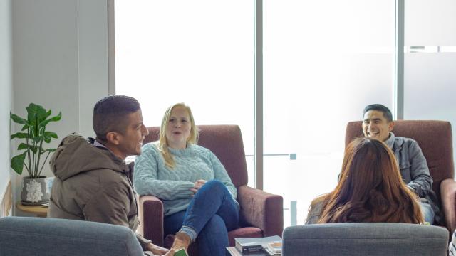 Group of staff in conversation