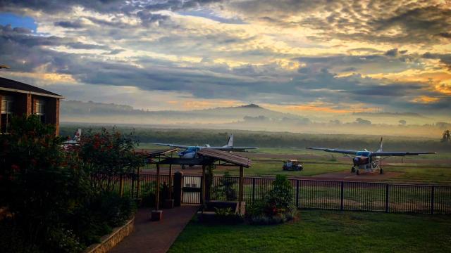 Beautiful sunrise over the EMI Uganda office building.